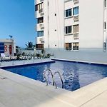 SOL, ARENA, MAR, y PISCINA
